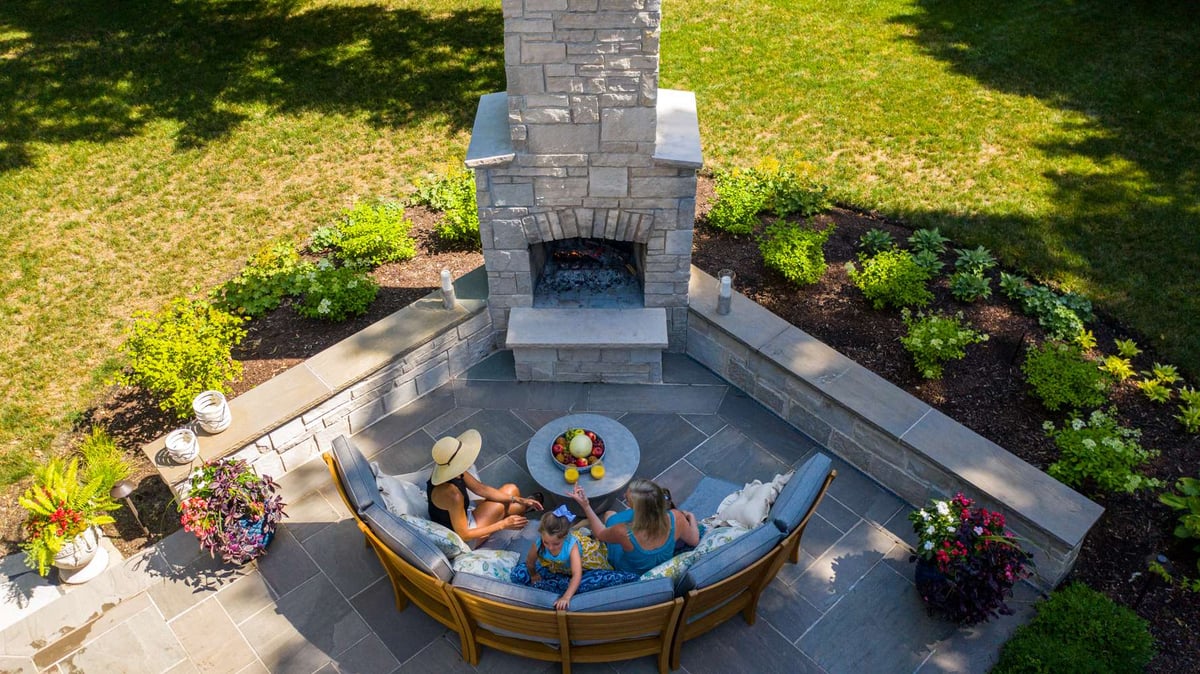 Outdoor Fireplace vs. Fire Pit Choosing What’s Best For Your Landscape